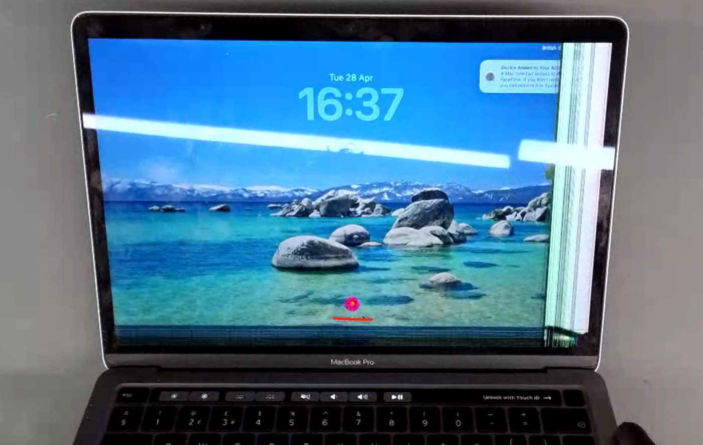 MacBook screen physical damage example — Backlight bands with coloured lines down one side